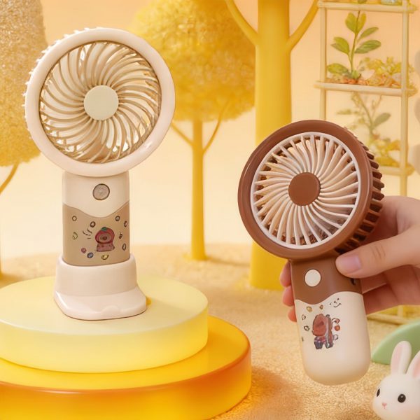 Capybara sticker-style mini fans showing desktop and handheld use