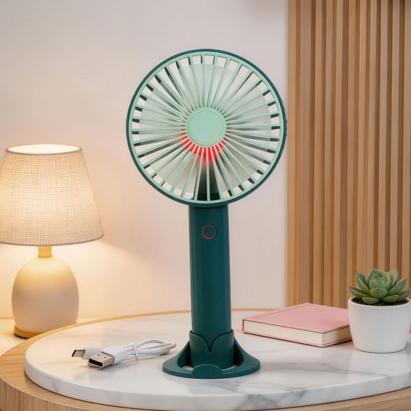 Green rechargeable handheld fan with desktop base, light and USB cable