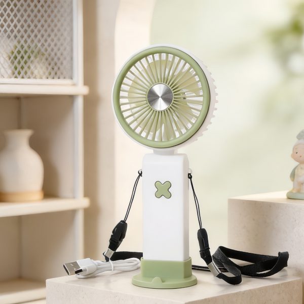 Green rechargeable handheld fan with pale green base and lanyard, shown on a tabletop
