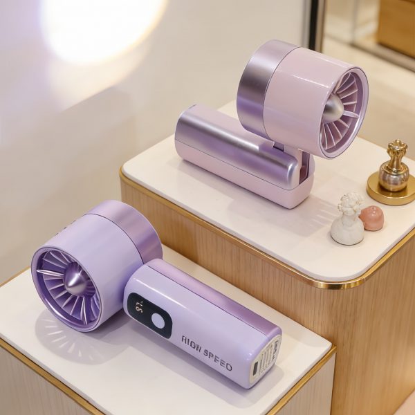 Purple rechargeable handheld fan in folded positions with charging-port area visible