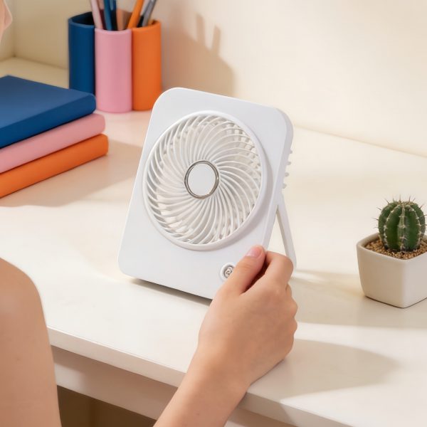 White square desktop fan with front button and rear stand