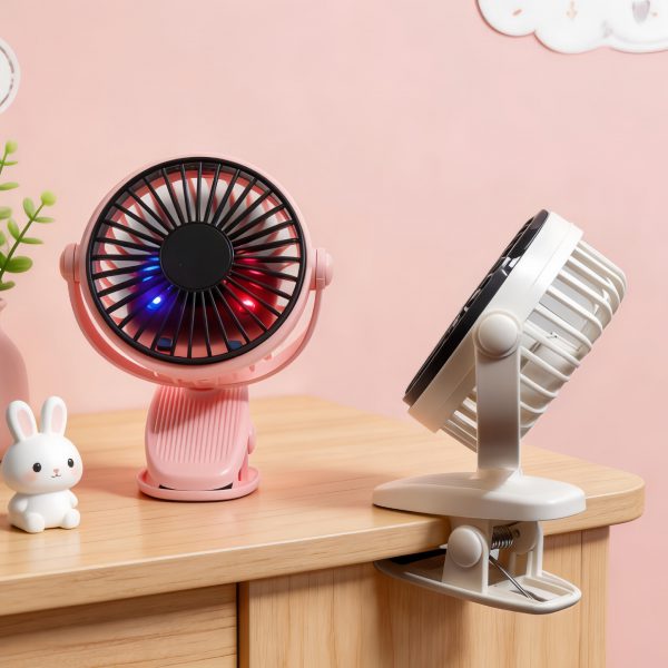 Pink Classic fan standing on a desk and White Classic fan with clip open; fans sold individually