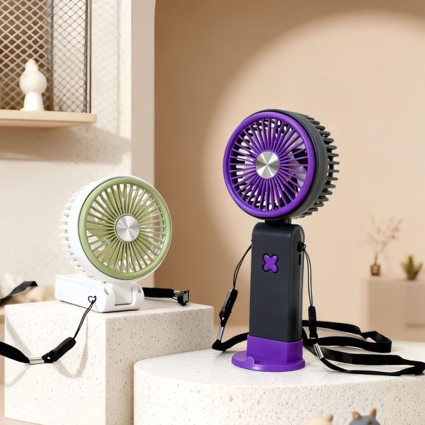 Green fan with tilted head beside Purple fan standing on its base; fans sold individually