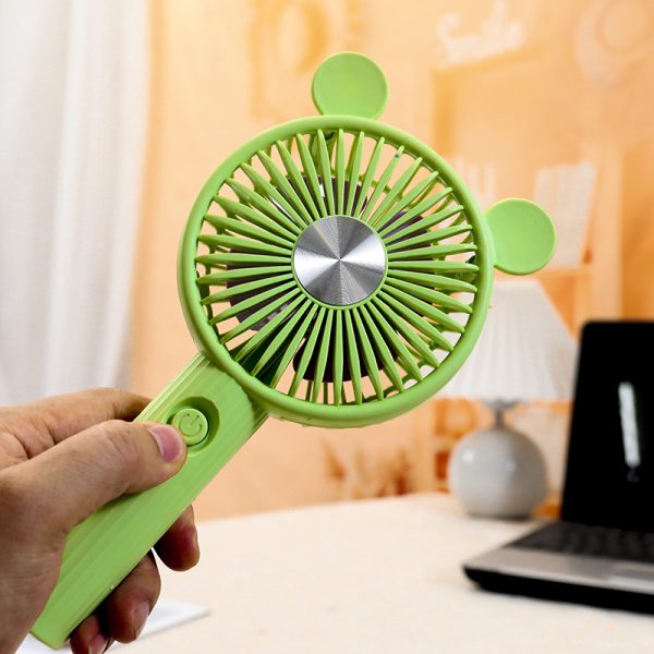 Green round-ear rechargeable mini fan held by hand