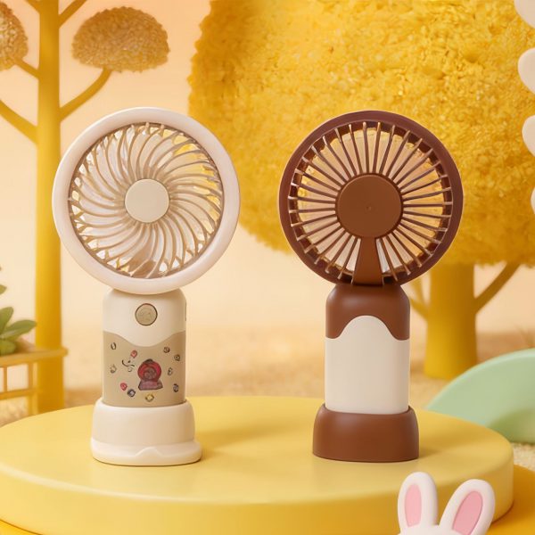 Beige and dark coffee capybara sticker-style mini fans showing front and rear views