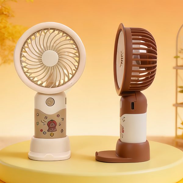Beige and dark coffee capybara sticker-style mini fans showing front and side views