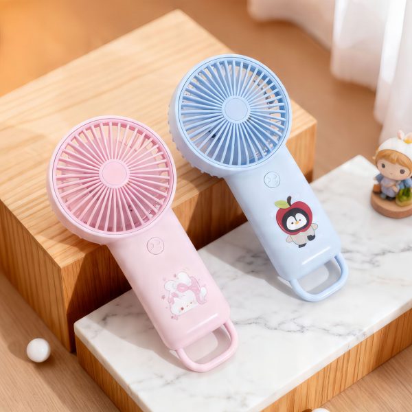 Pink and Blue cartoon handheld fans resting on their integrated loops; fans sold individually